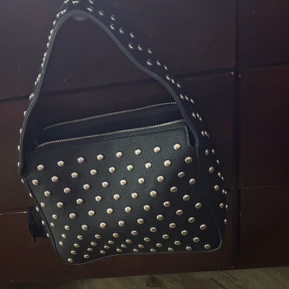 Studded Black Handbag
New never used
Leather